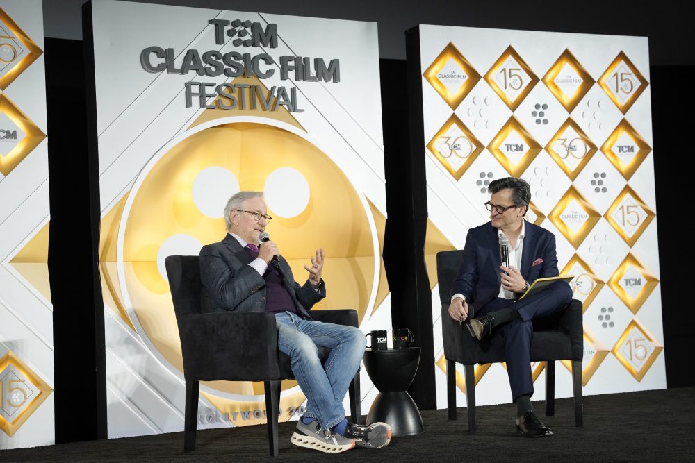 HOLLYWOOD, CALIFORNIA - APRIL 19: (L-R) Steven Spielberg and TCM Host Ben Mankiewicz speak onstage at the 